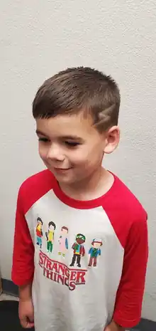 Kids’ haircut with shaved line design by Andrew Stylez Hair in Las Vegas