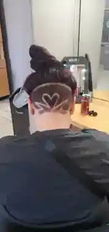 Women’s undercut with shaved heart design by Andrew Stylez Hair in Las Vegas